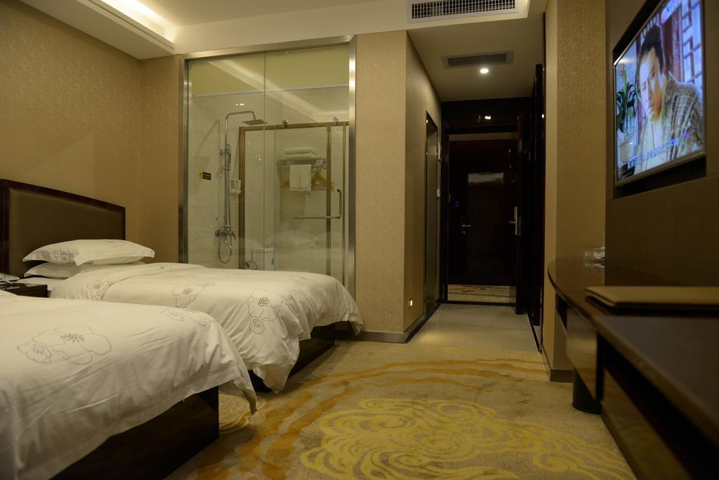Tie Cheng Hotel Cantão Quarto foto